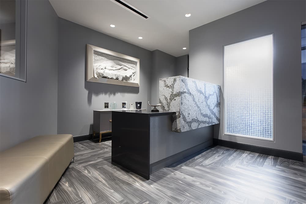 The reception desk with a marble feature panel