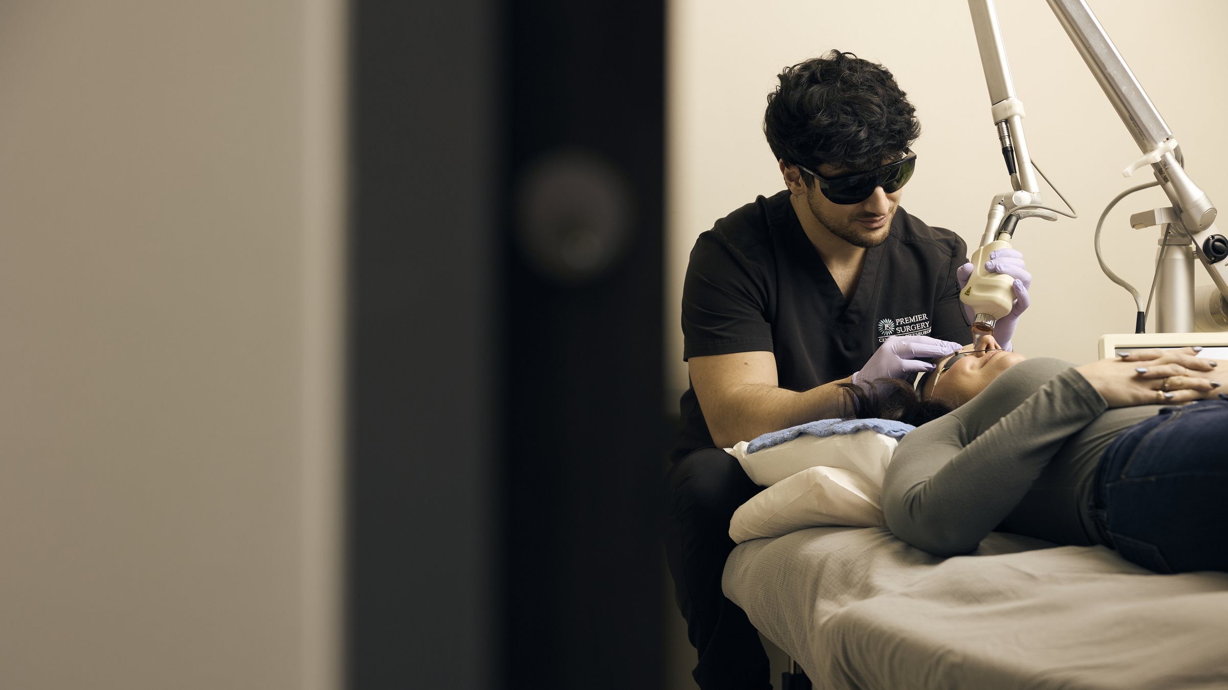 Tyler Jones, PA-C, performing a CO2 laser resurfacing treatment