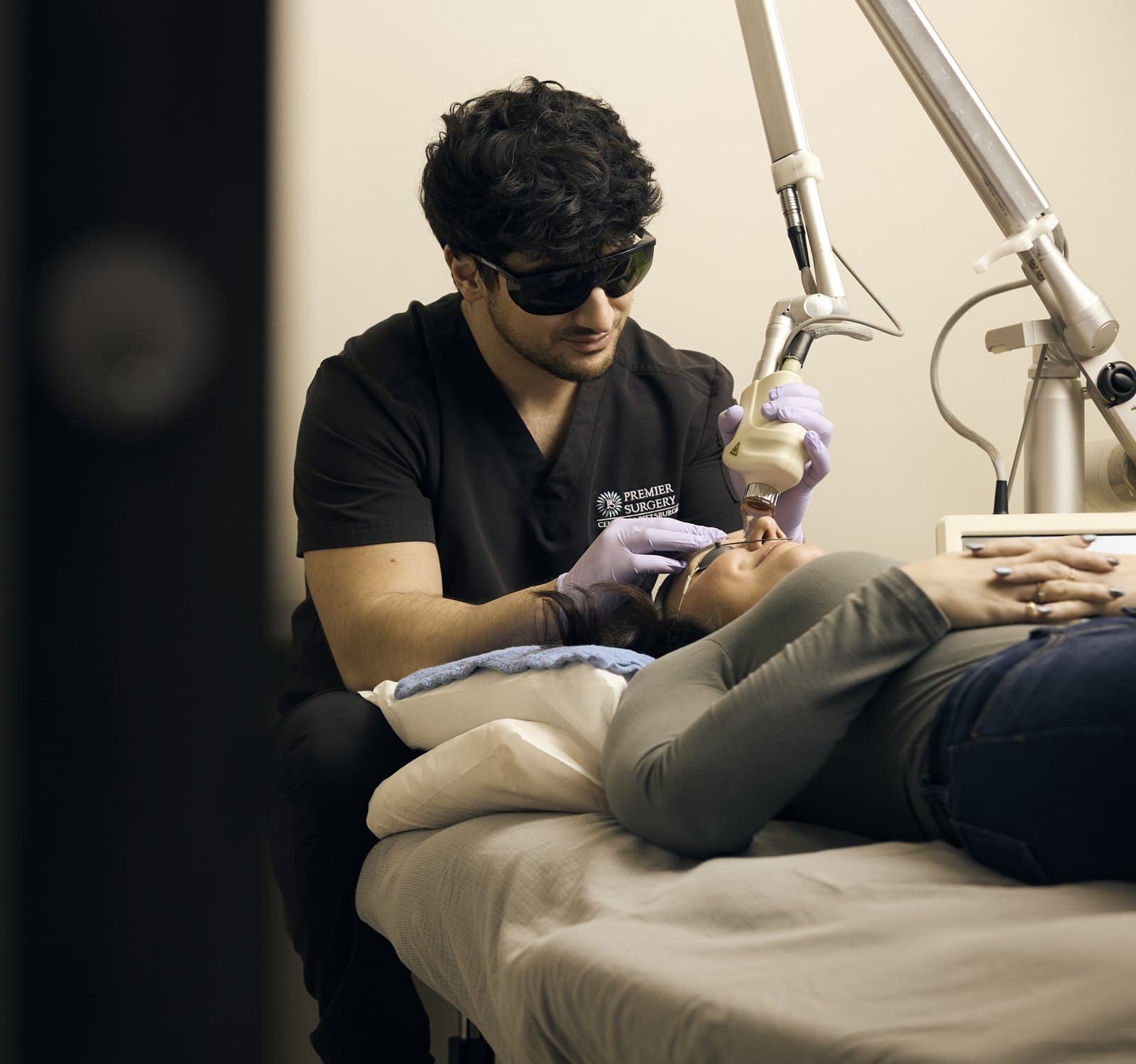 Tyler Jones, PA-C, performing a CO2 laser resurfacing treatment on a patient