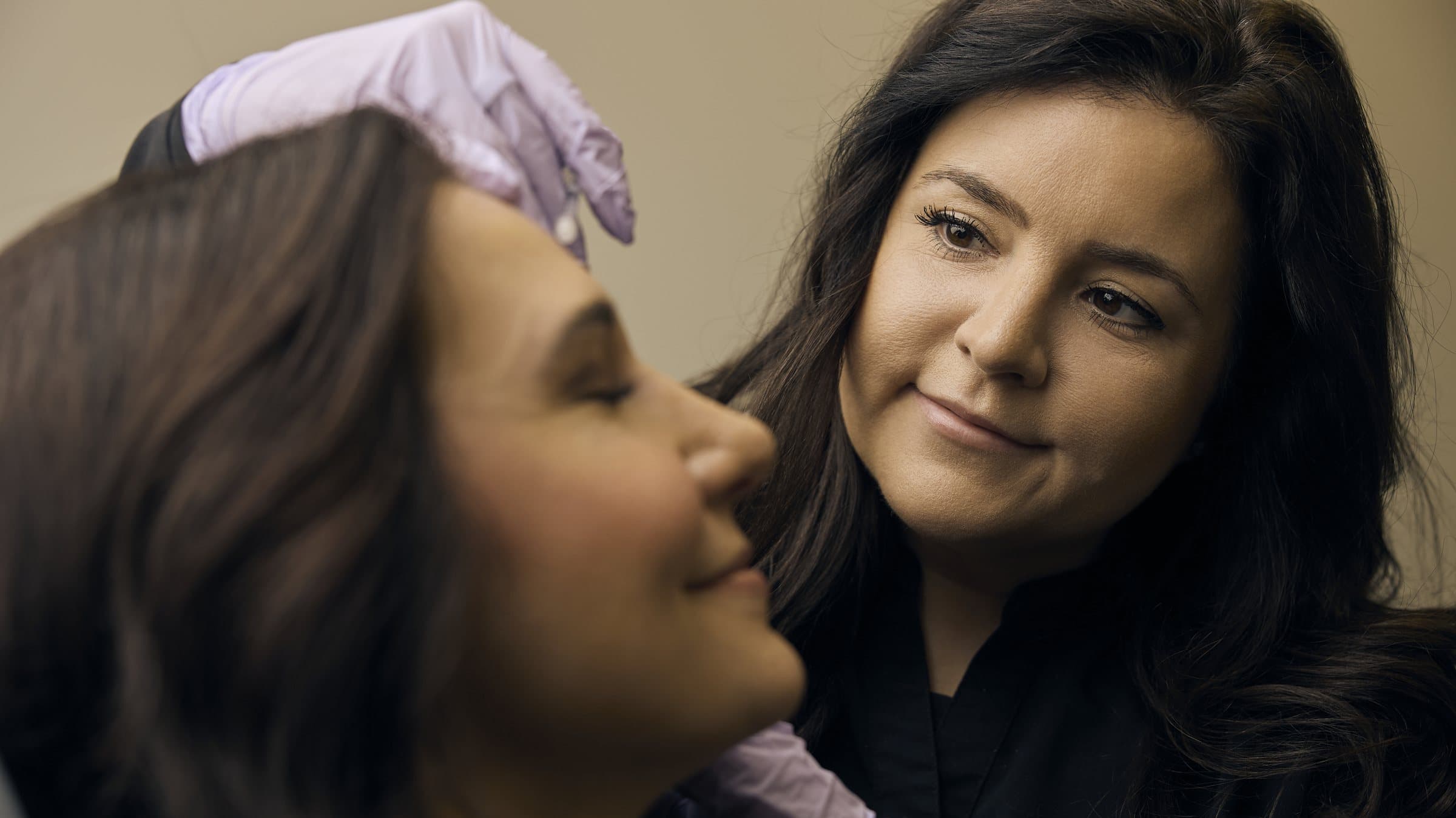 Carey Steinmetz, PA-C, placing a filler injection