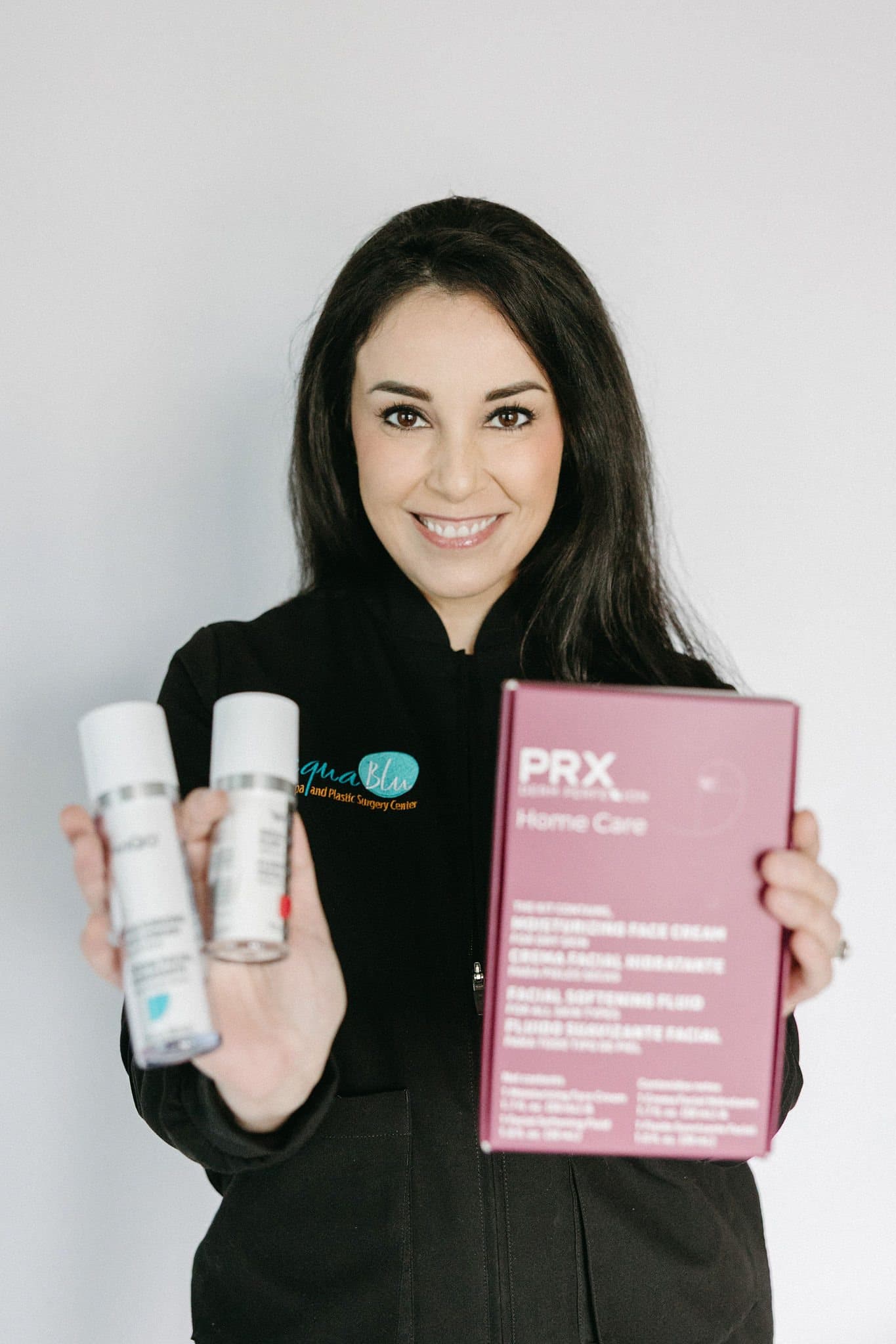 Anna Manion-Birmingham holding the PRX Derm Perfexion home care kit