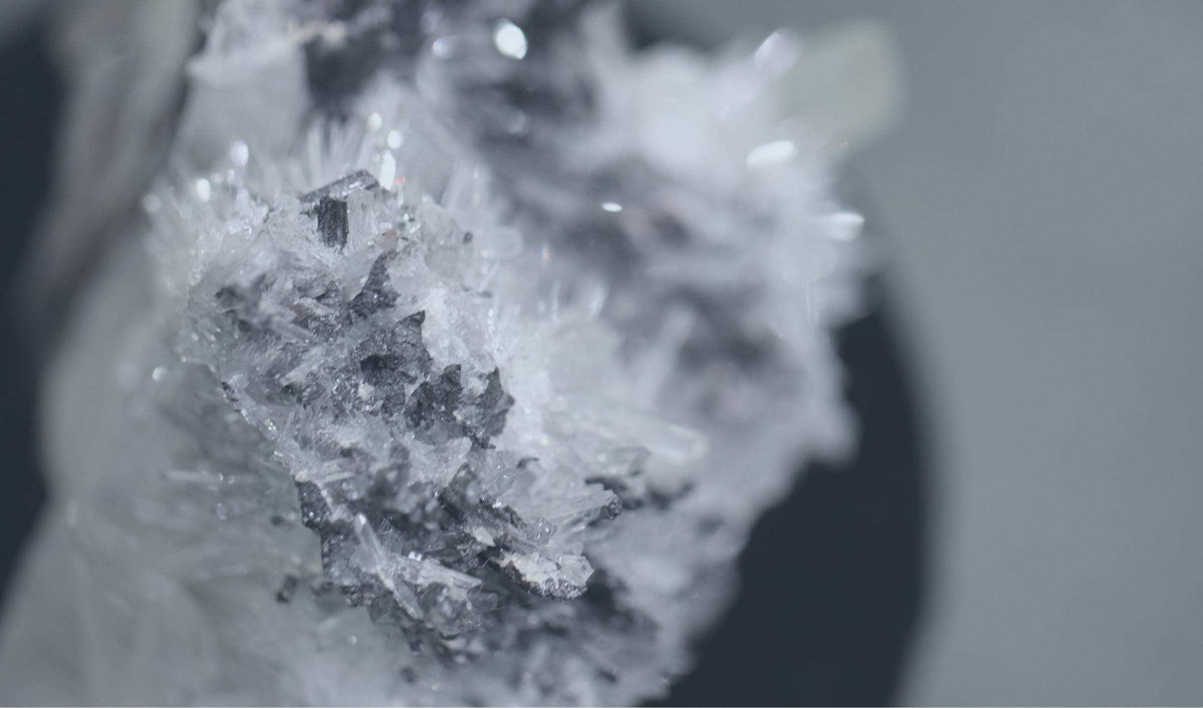 A woman resting her chin on her hand